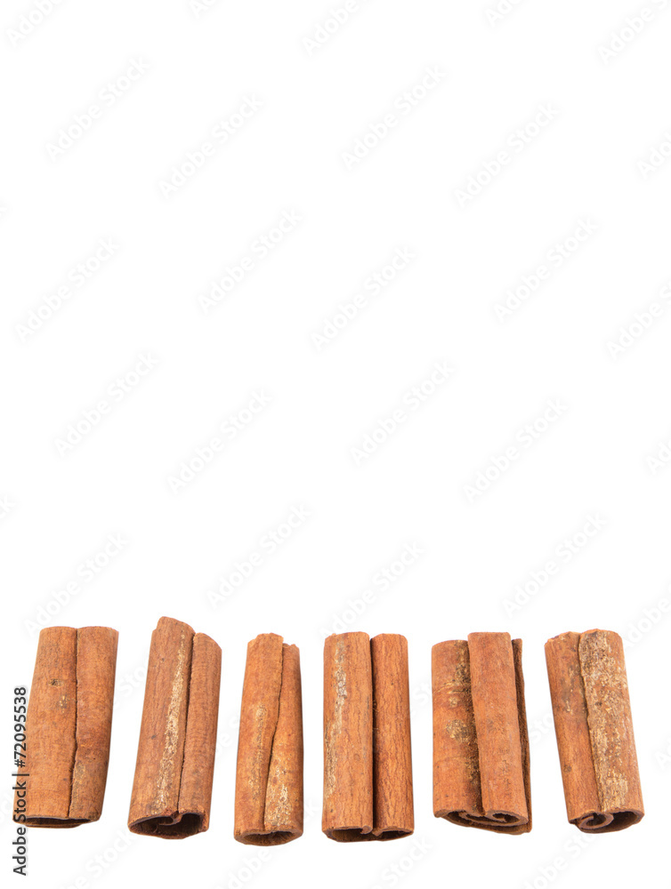 Cinnamon sticks over white background Cinnamon sticks over white background