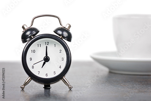 Alarm clock with cup of coffee