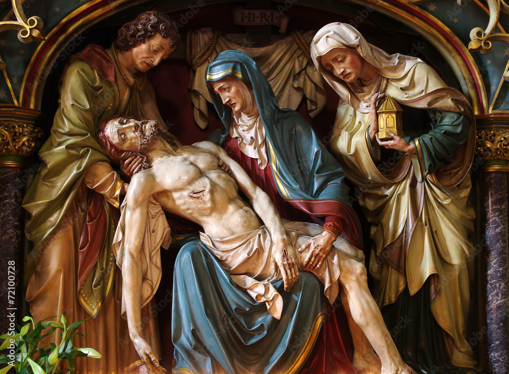 Virgin Mary cradling the dead body of Jesus,