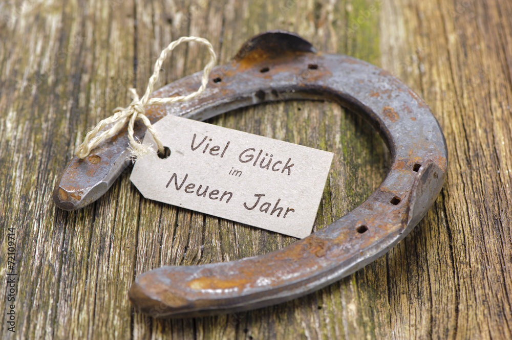 Neujahr 2015 mit Hufeisen als Glücksbringer StockFoto Adobe Stock