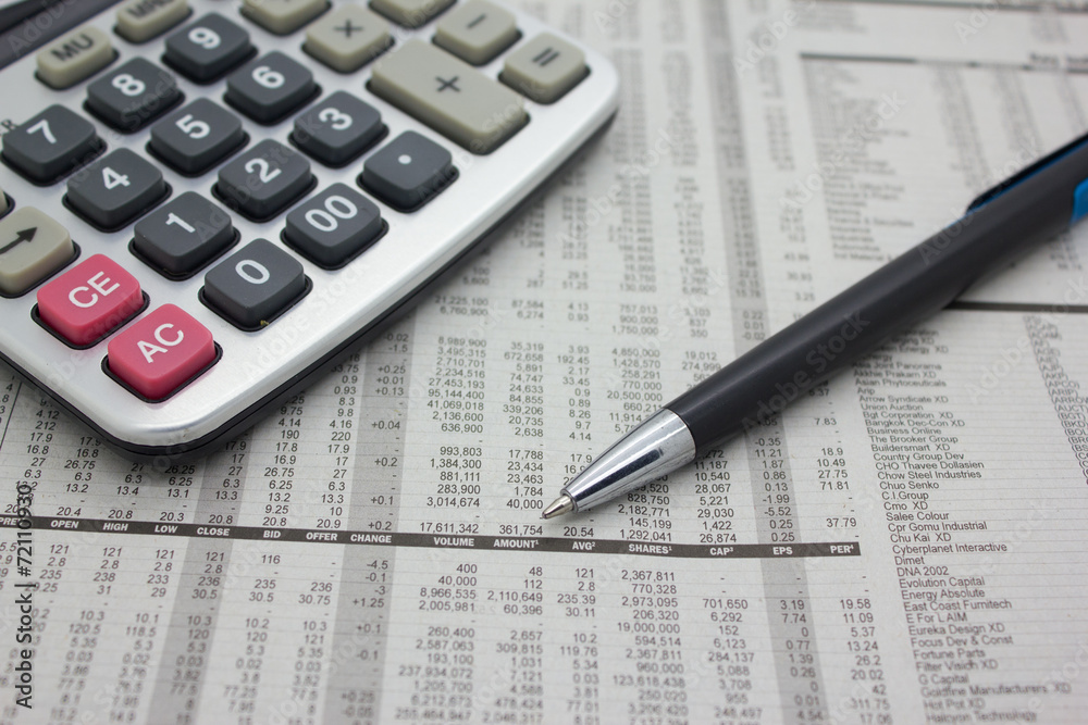 Business background with calculator and pen. Business background with calculator and pen.