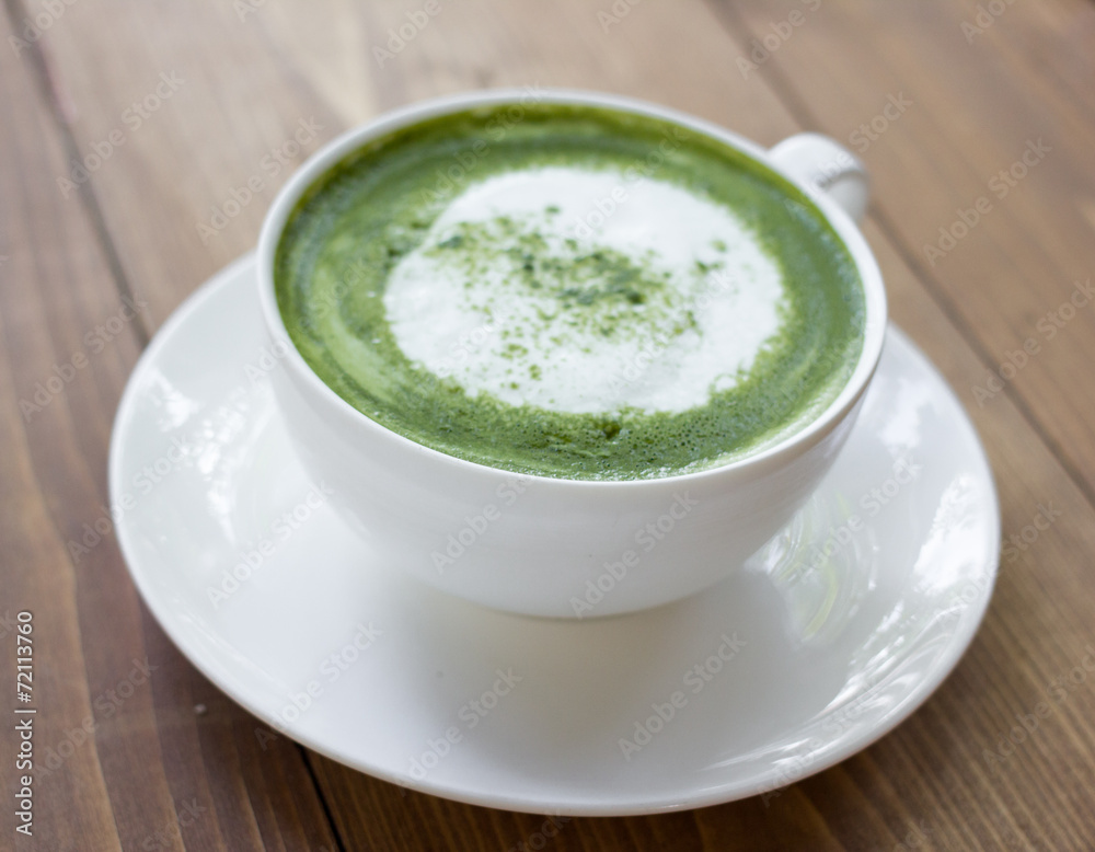 Matcha green tea latte beverage in glass. Matcha green tea latte beverage in glass.