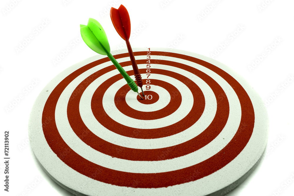 Red dart target with red and green arrows