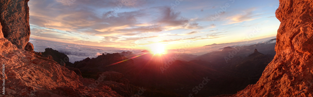 Fiery sunrise over a mountain landscape