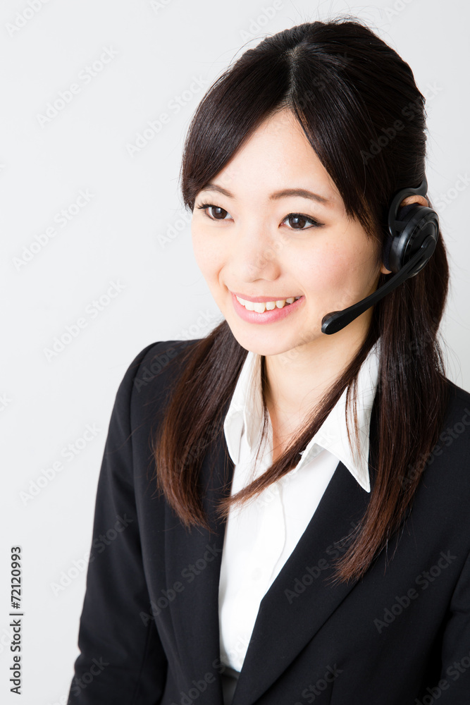 asian businesswoman using headset asian businesswoman using headset