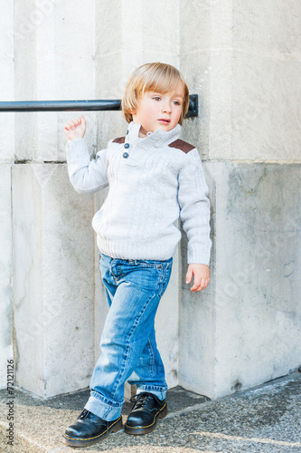 Outdoor portrait of a cute toddler boy © annanahabed