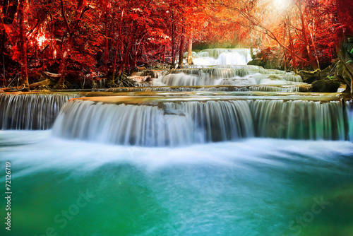 Beautiful waterfall in autumn forest