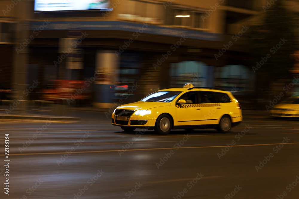 yellow taxi moves on the night city street yellow taxi moves on the night city street