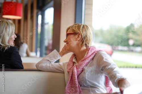 Women chat in restaurant
