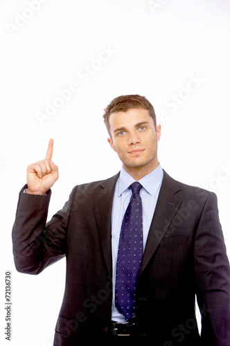 Businessman pointing above his head