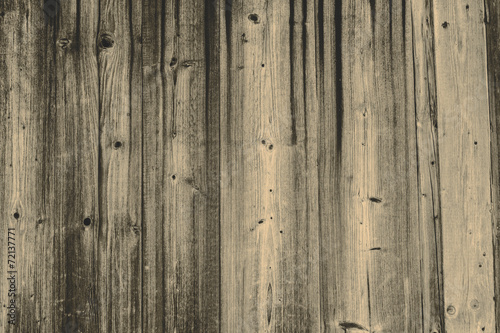 the dark wood texture with natural patterns