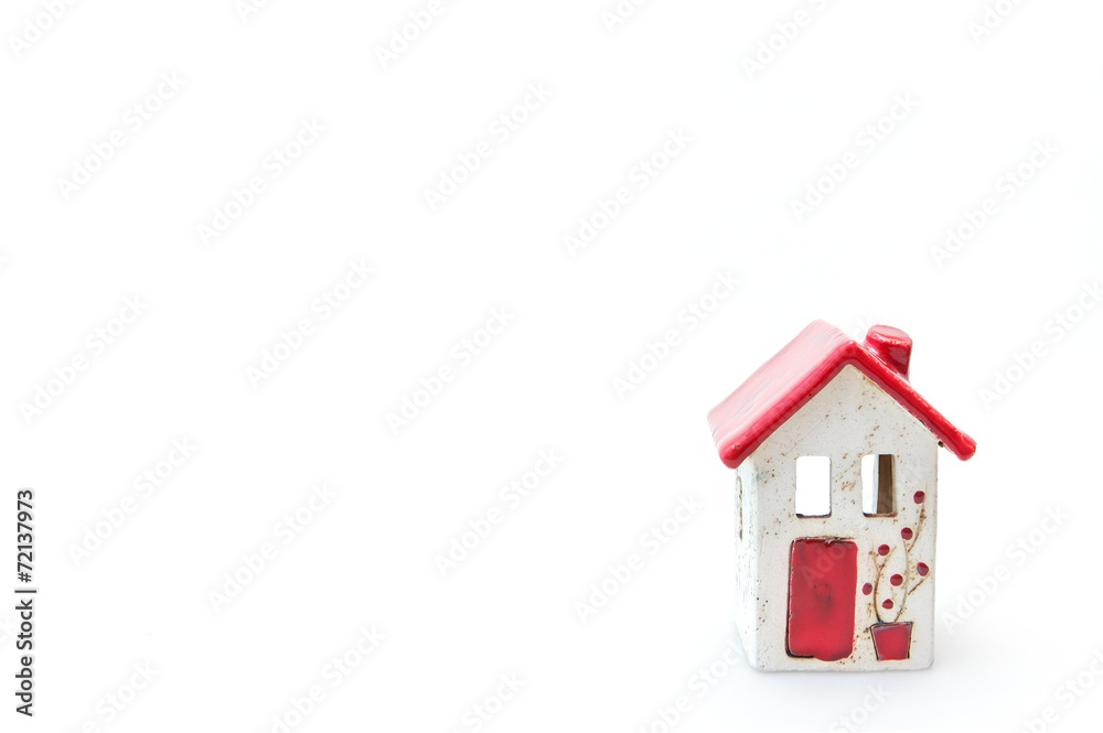Red and white house on white background Red and white house on white background