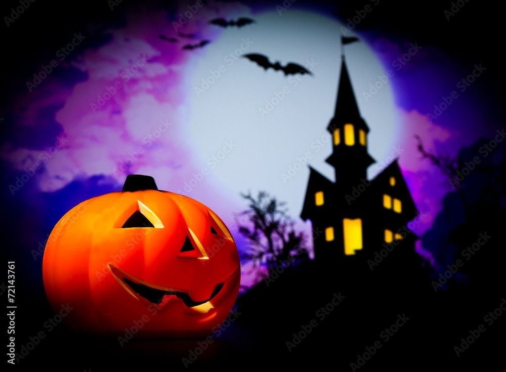 Halloween night background with scary house and bat and pumpkin