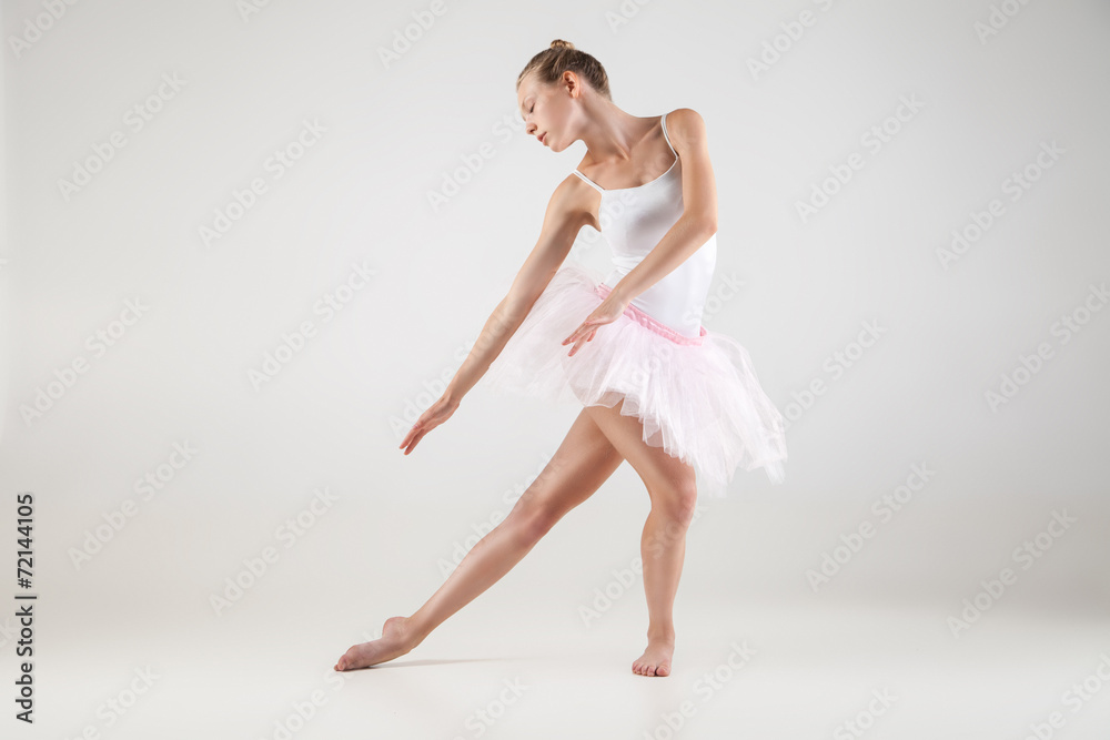 Ballerina in classical tutu over white background Ballerina in classical tutu over white background