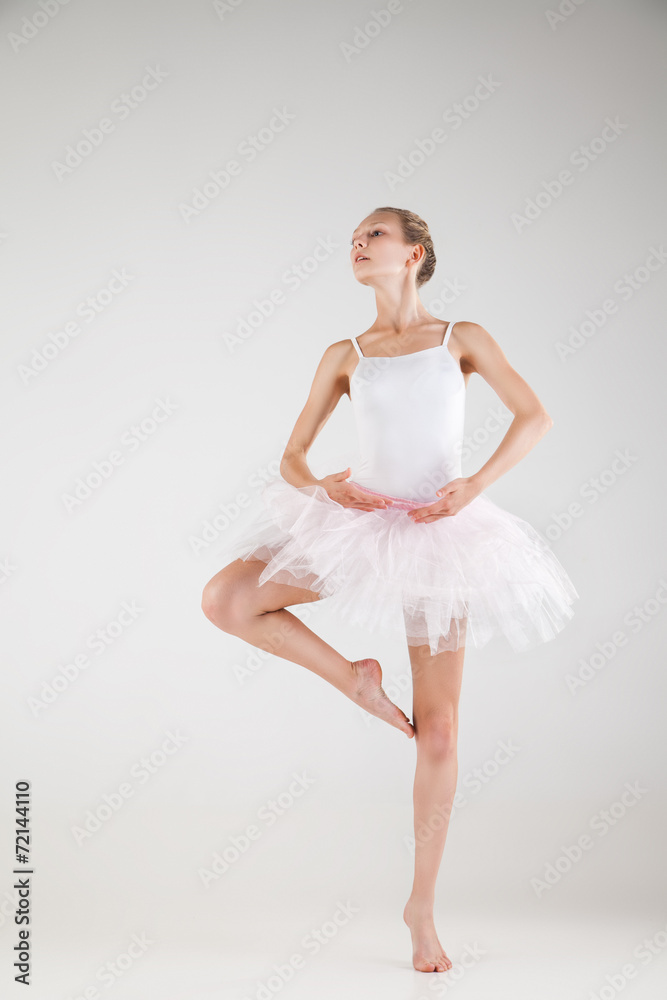 Ballerina in classical tutu over white background Ballerina in classical tutu over white background