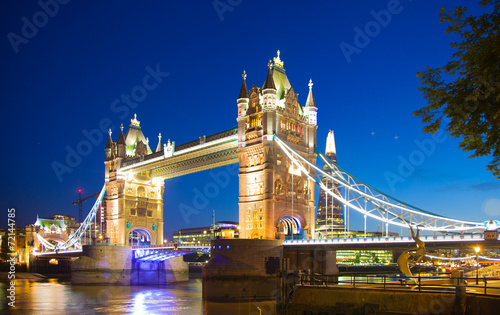 Tower bridge on the river Thames in night lights