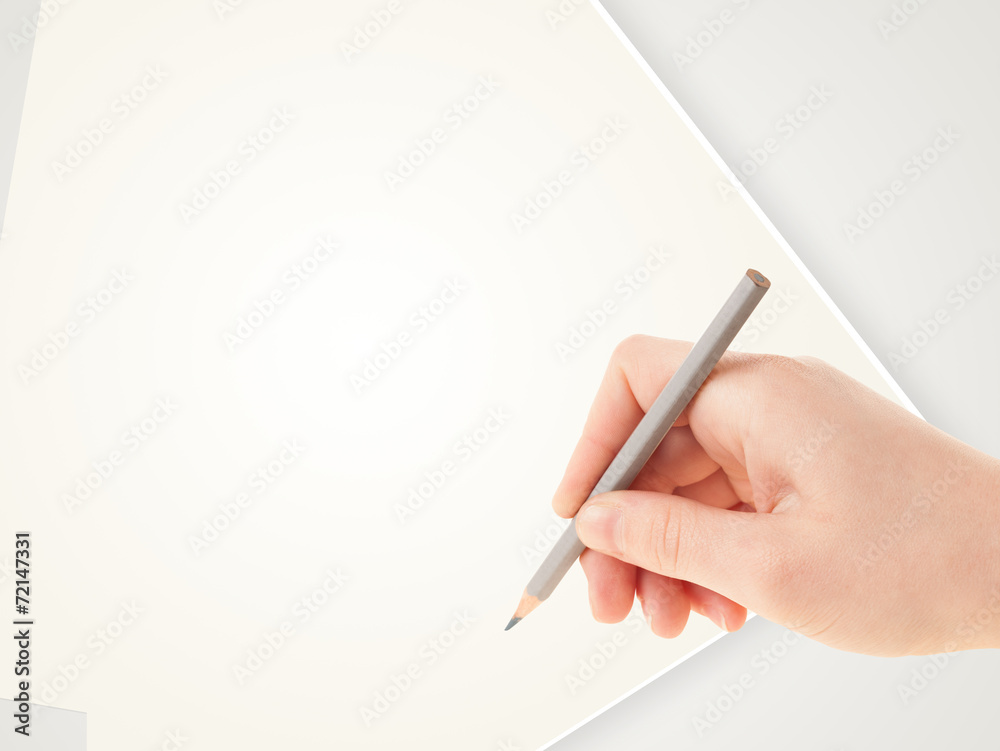 Human hand drawing with pencil on empty paper template Human hand drawing with pencil on empty paper template