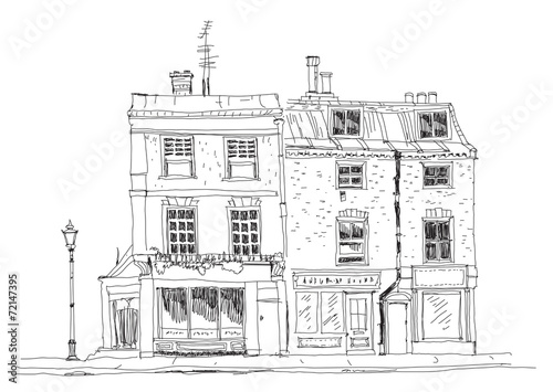 Fototapeta Old English town houses with shops on the ground floor. Sketch