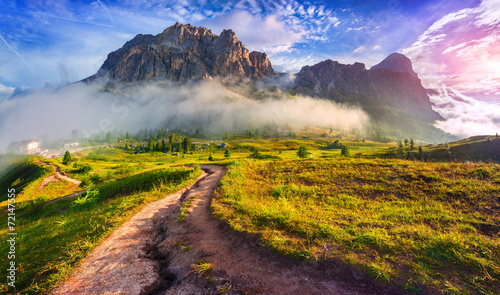 Valokuva Tofane mountain range at sunny foggy morning. View from Falzareg