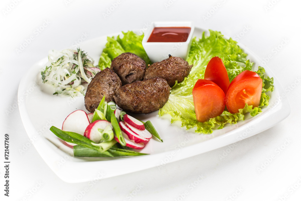 kebab with vegetable and greens
