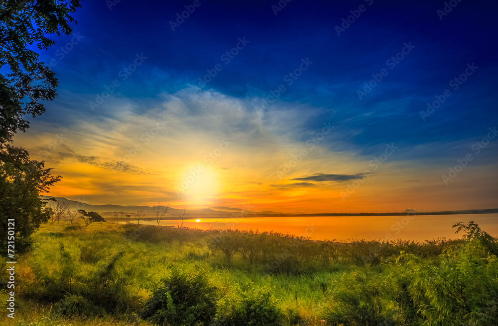 Landscape Sunrise-sunset  reflection on calm lake  Green