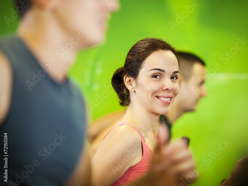 Beautiful young women exercising in a fitness center
