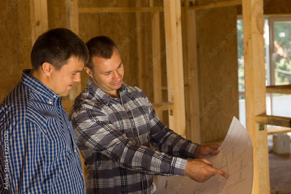 Architect and Client Discussing the Design Architect and Client Discussing the Design