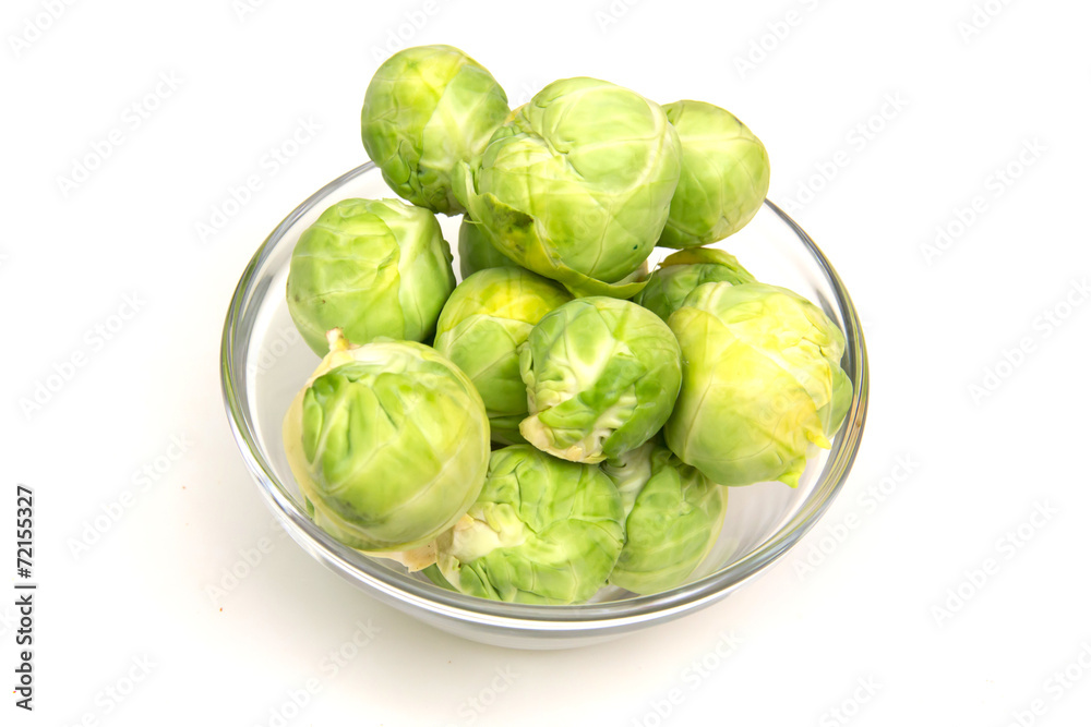 Brussels sprouts on bowl on white background Brussels sprouts on bowl on white background