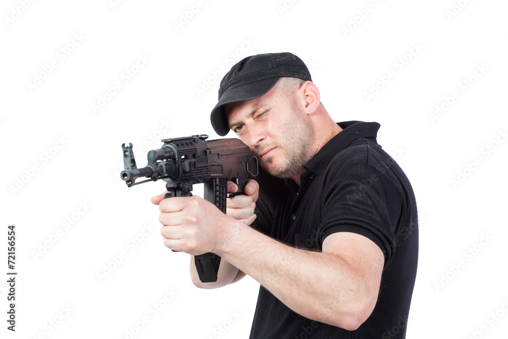 Man pointing AK-47 machine gun, isolated on white