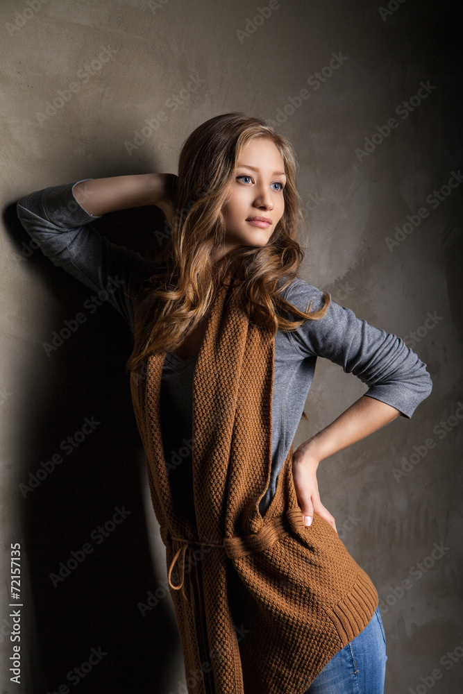 Young woman in jeans with autumn leaves Young woman in jeans with autumn leaves