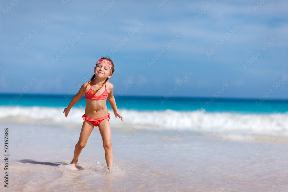 Adorable little girl at beach