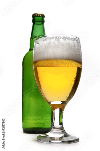 Glass of real beer isolated on white background