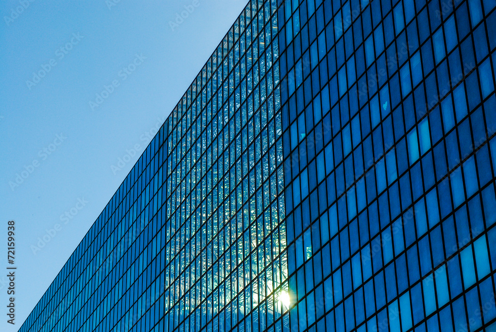 modern building with glasses at the business district modern building with glasses at the business district