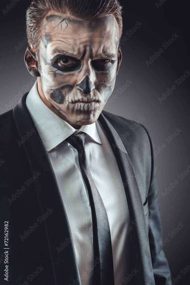 Fototapeta premium Portrait serious businessman makeup skeleton