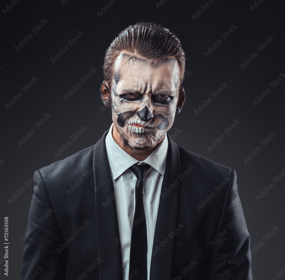 incredulous businessman with makeup skeleton incredulous businessman with makeup skeleton