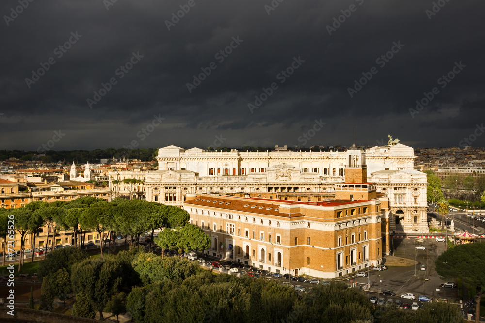 Rome buildings against dark clouds