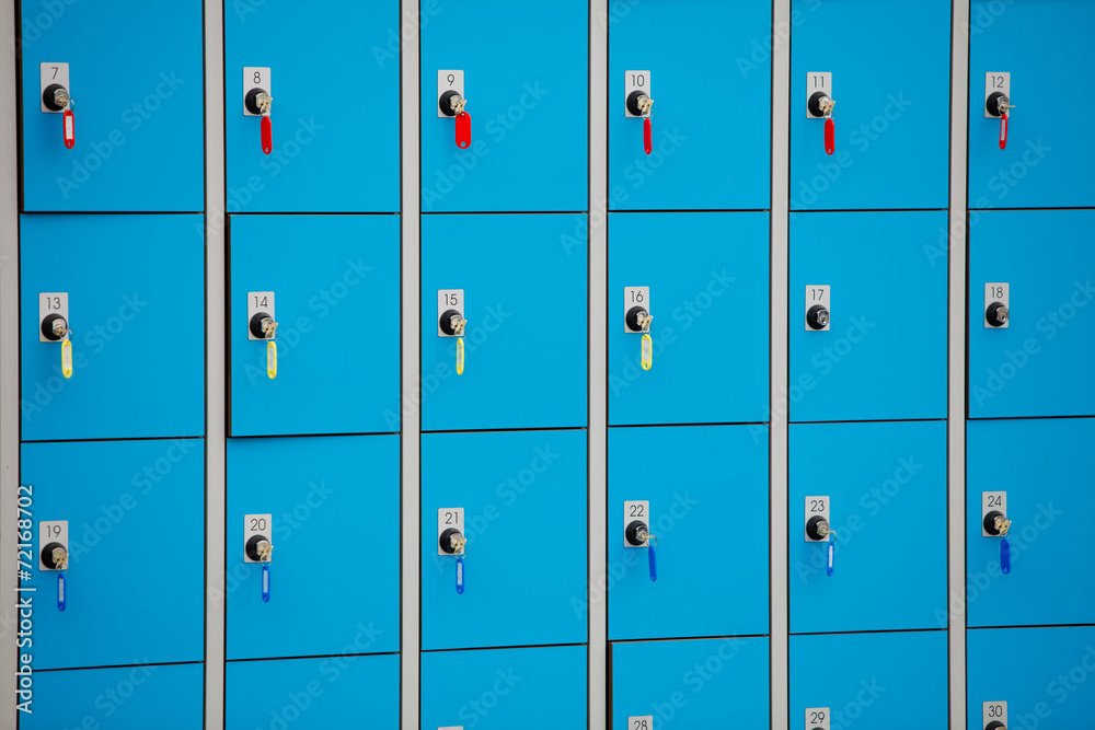 Fototapeta premium closeup blue deposite boxes with keys. left luggage