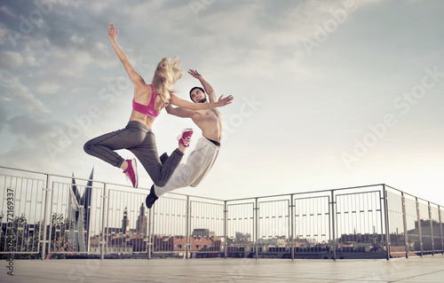 Athletic couple during the jump training