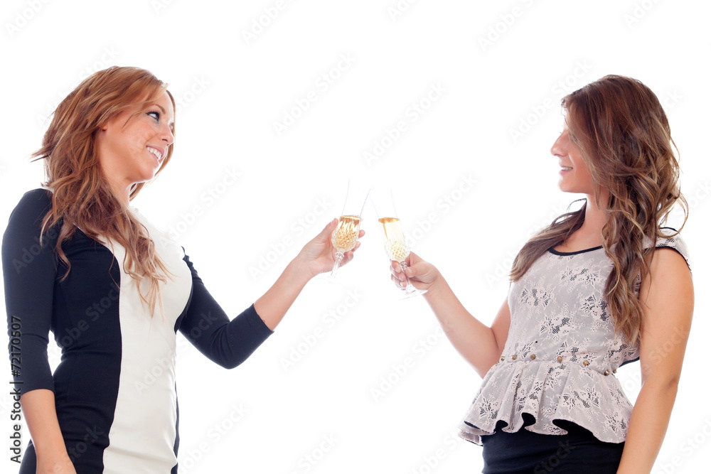 Group of friends toasting with champagne in Christmas Group of friends toasting with champagne in Christmas