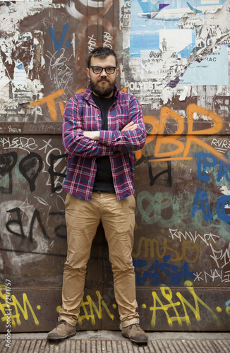Man With Beard And Glasses On Rainy Day Graffiti Wall