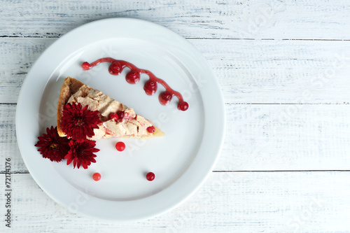 Piece of tasty pie with apples and berry mousse,