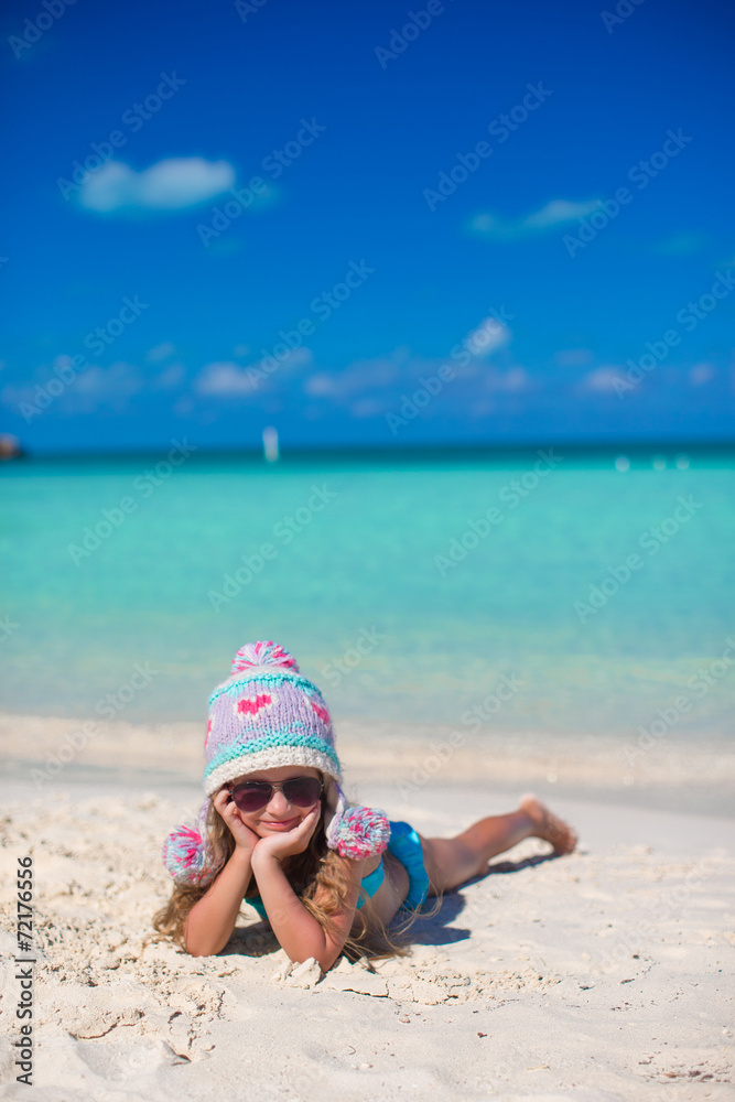 Portrait of adorable little girl on summer vacation at white