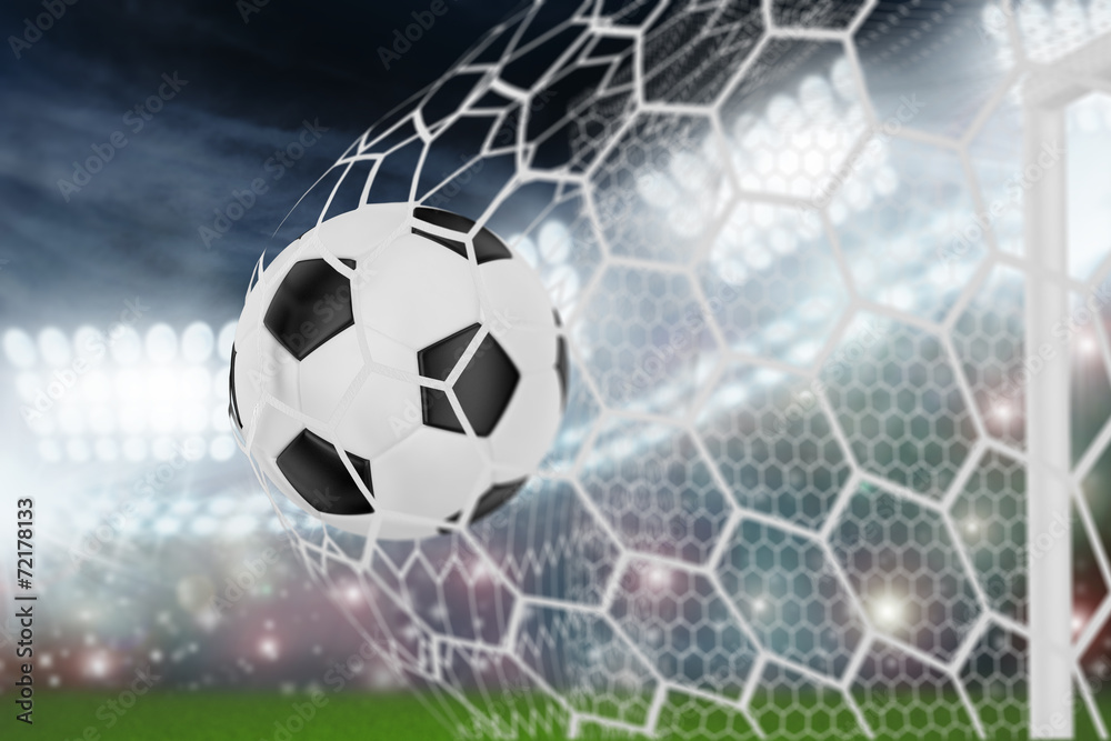 Fototapeta premium soccer ball in goal net