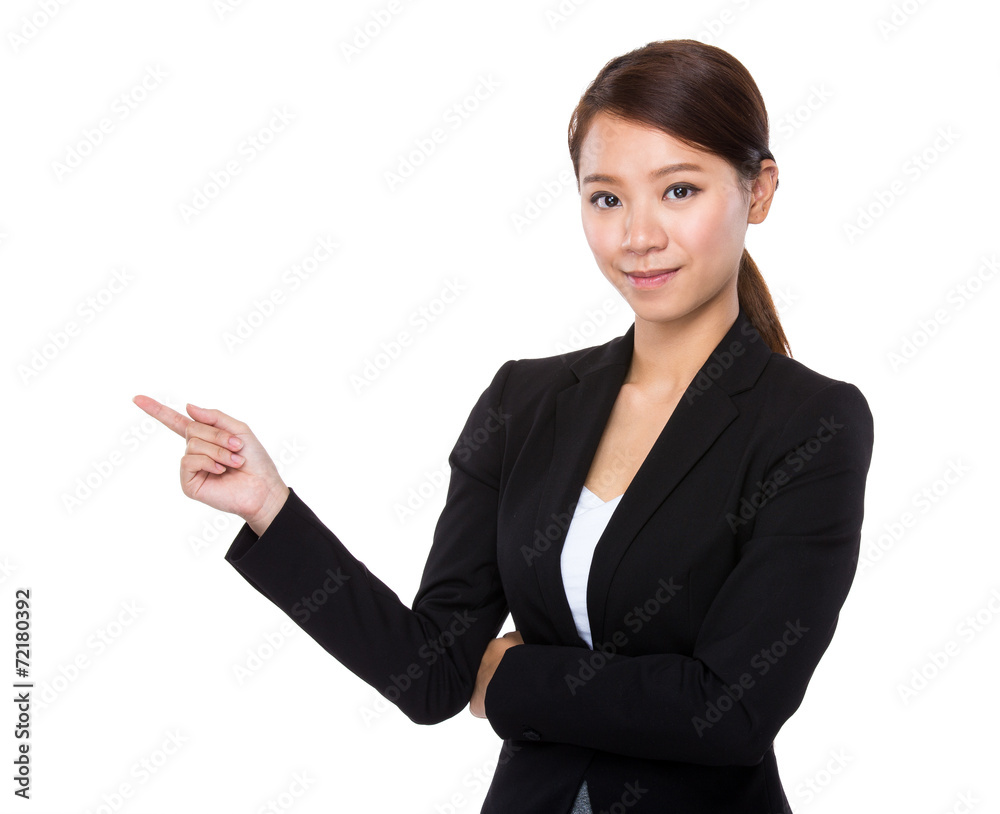 Businesswoman with finger point aside Businesswoman with finger point aside