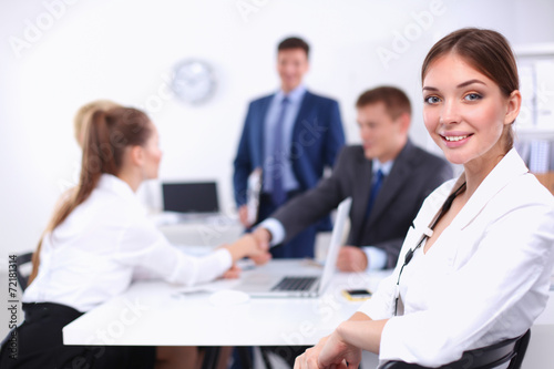 Business people shaking hands, finishing up a meeting