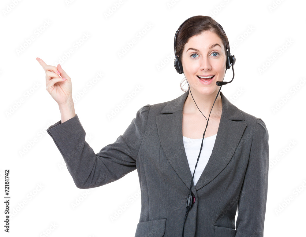 Businesswoman with headset and finger point up Businesswoman with headset and finger point up