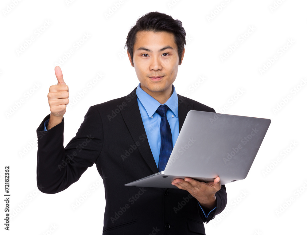 Businessman with laptop computer and thumb up Businessman with laptop computer and thumb up