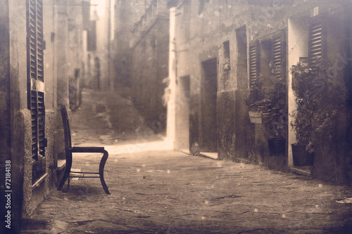 Fototapeta Naklejka Na Ścianę i Meble -  Street in a hill town from Tuscany, Italy