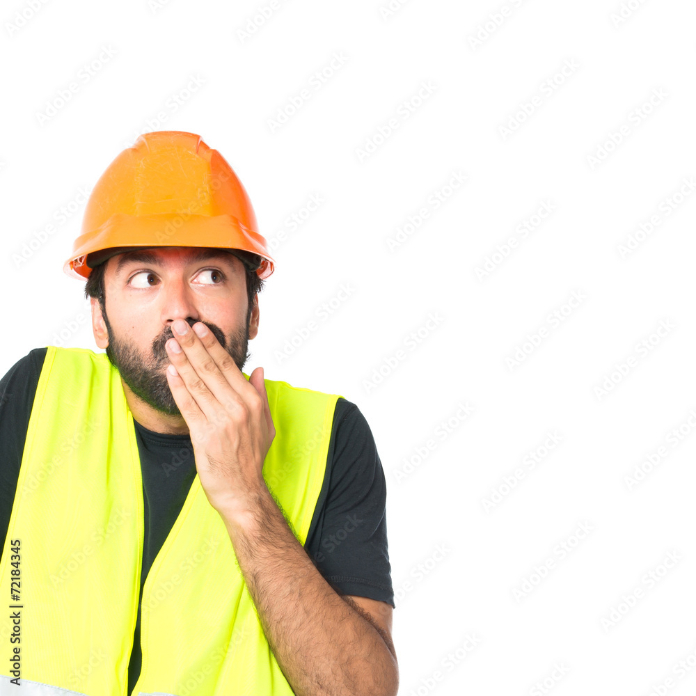 Workman doing surprise gesture over white background Workman doing surprise gesture over white background