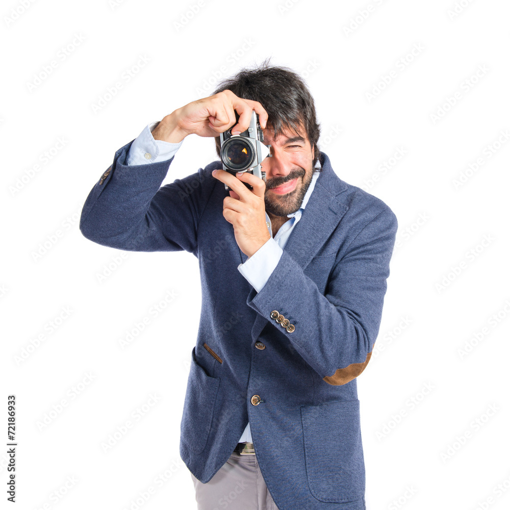 Man photographing over white background Man photographing over white background